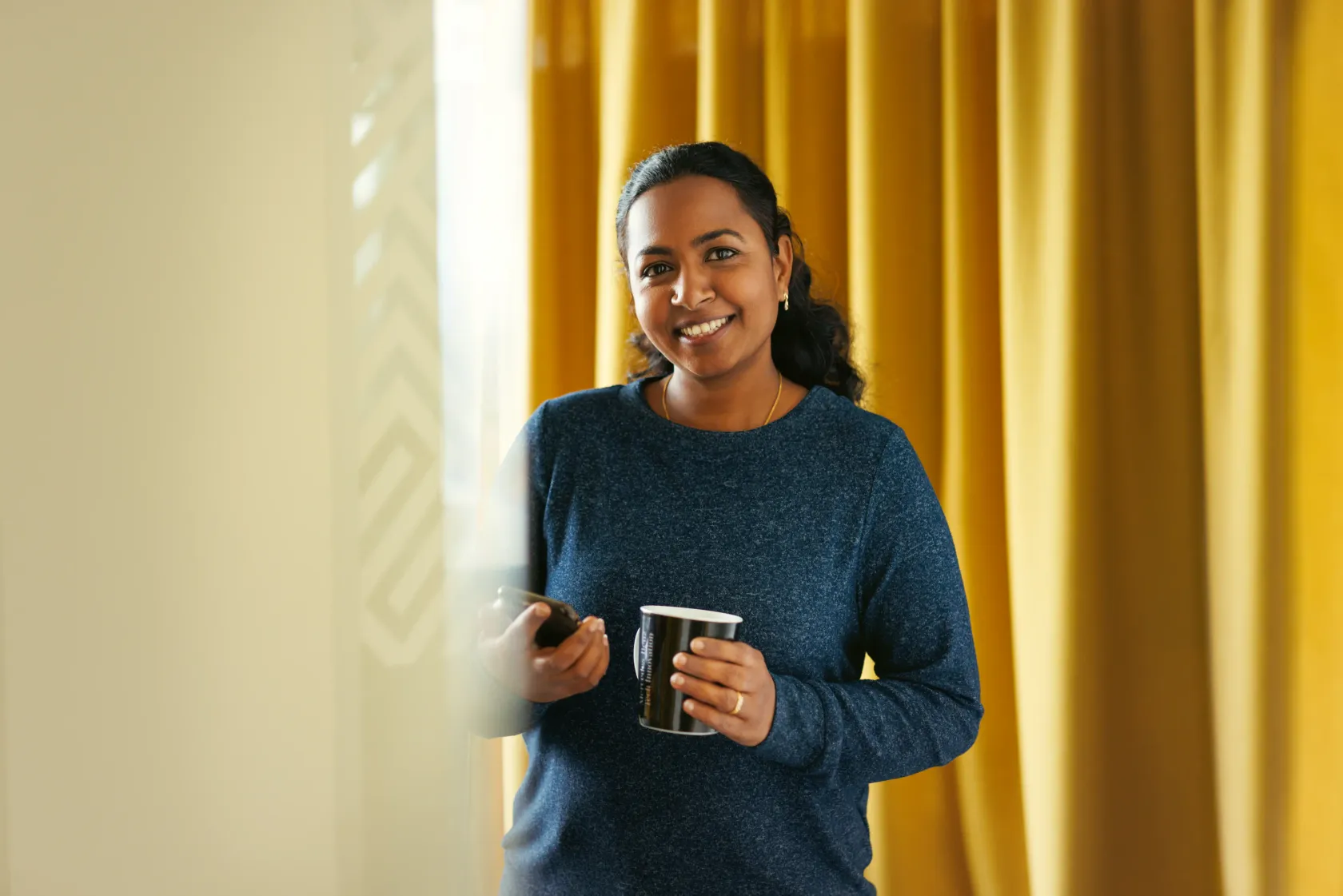 Portrait of a female colleague in a blue top
